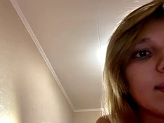 Teen blonde girl playing on webcam