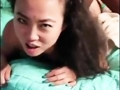 Striking Asian babe finds pleasure between two black cocks