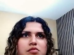 curly Latina twerk and masturbate with her dildo on cam