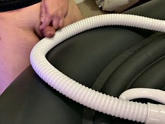 Small cock masturbates, rubs and cums on a vacuum hose