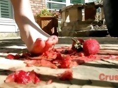 Sexy half Asian girl tramples fruit with her feet