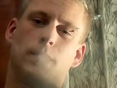 Twink cigar smoker wanks his shaved cock and jizzes solo